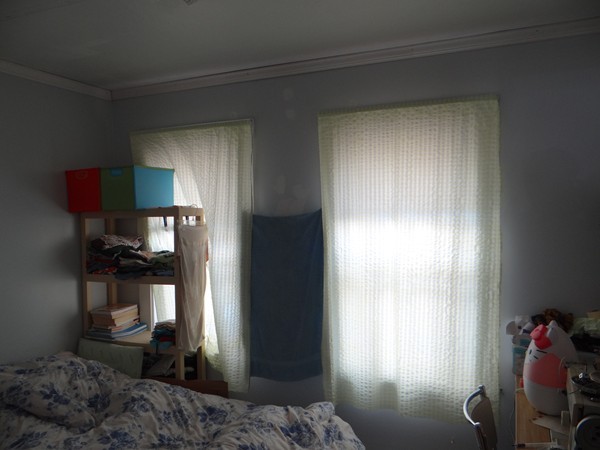 159 Sturges Street Medford, MA 02155 - Photo 6 of 12 a view of a livingroom with furniture and a window