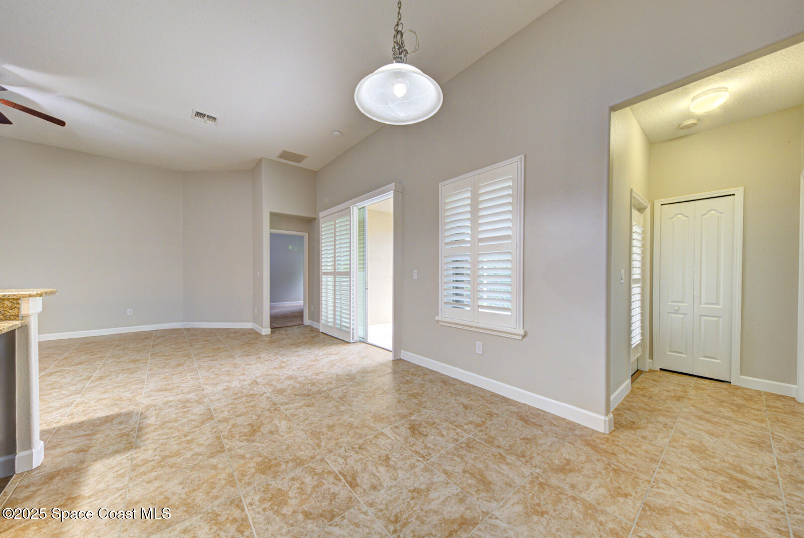 3352 Russ Place Melbourne, FL 32940 - Photo 23 of 67 a view of an empty room with a window