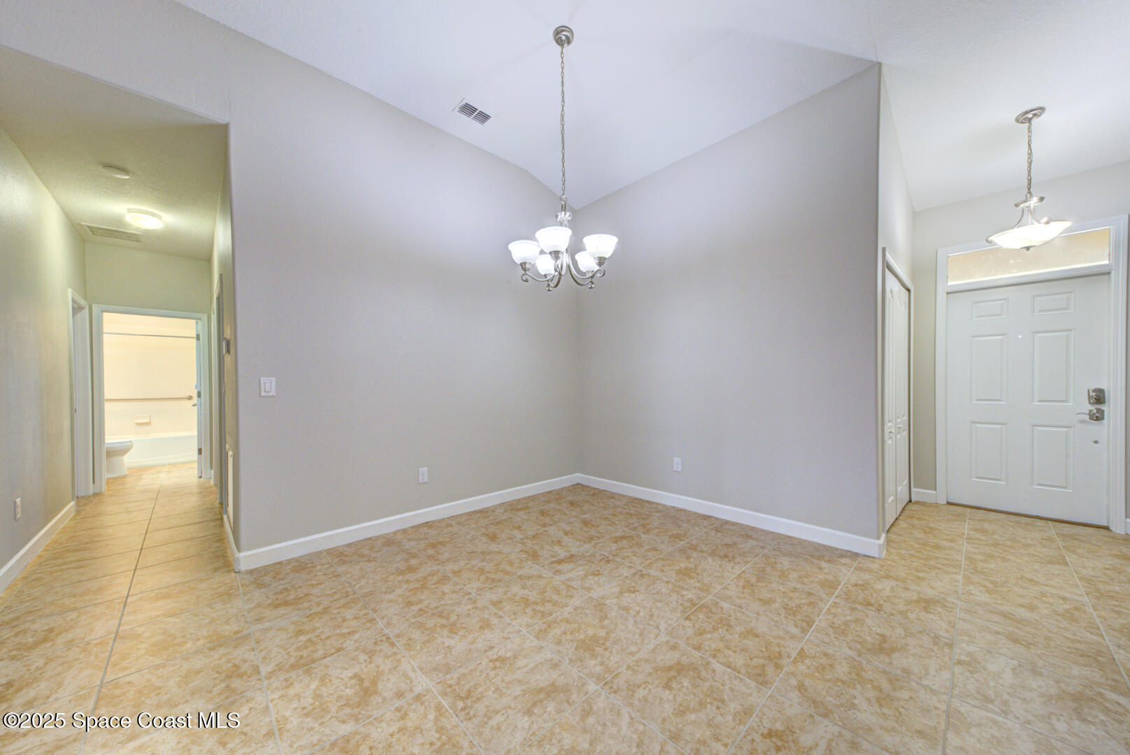 3352 Russ Place Melbourne, FL 32940 - Photo 26 of 67 a view of a chandelier in big room and chandelier