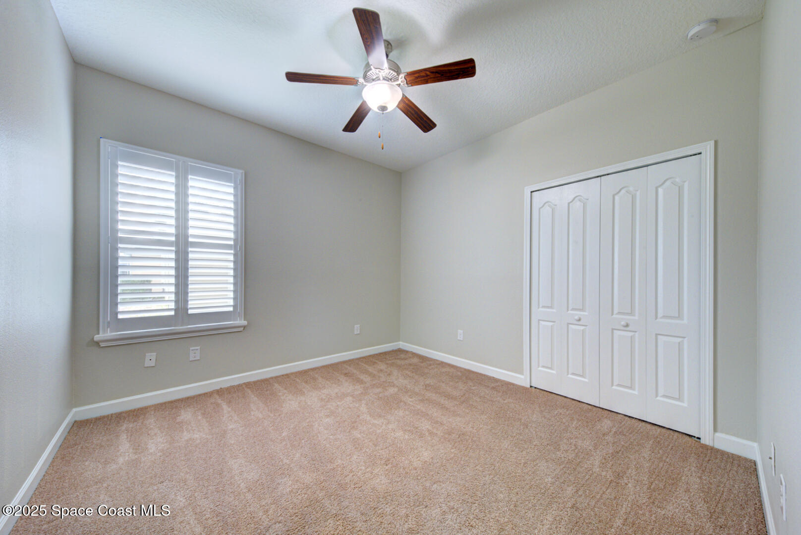 3352 Russ Place Melbourne, FL 32940 - Photo 47 of 67 a view of an empty room with a window