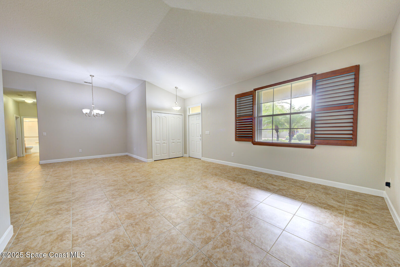 3352 Russ Place Melbourne, FL 32940 - Photo 5 of 67 a view of an empty room with a window