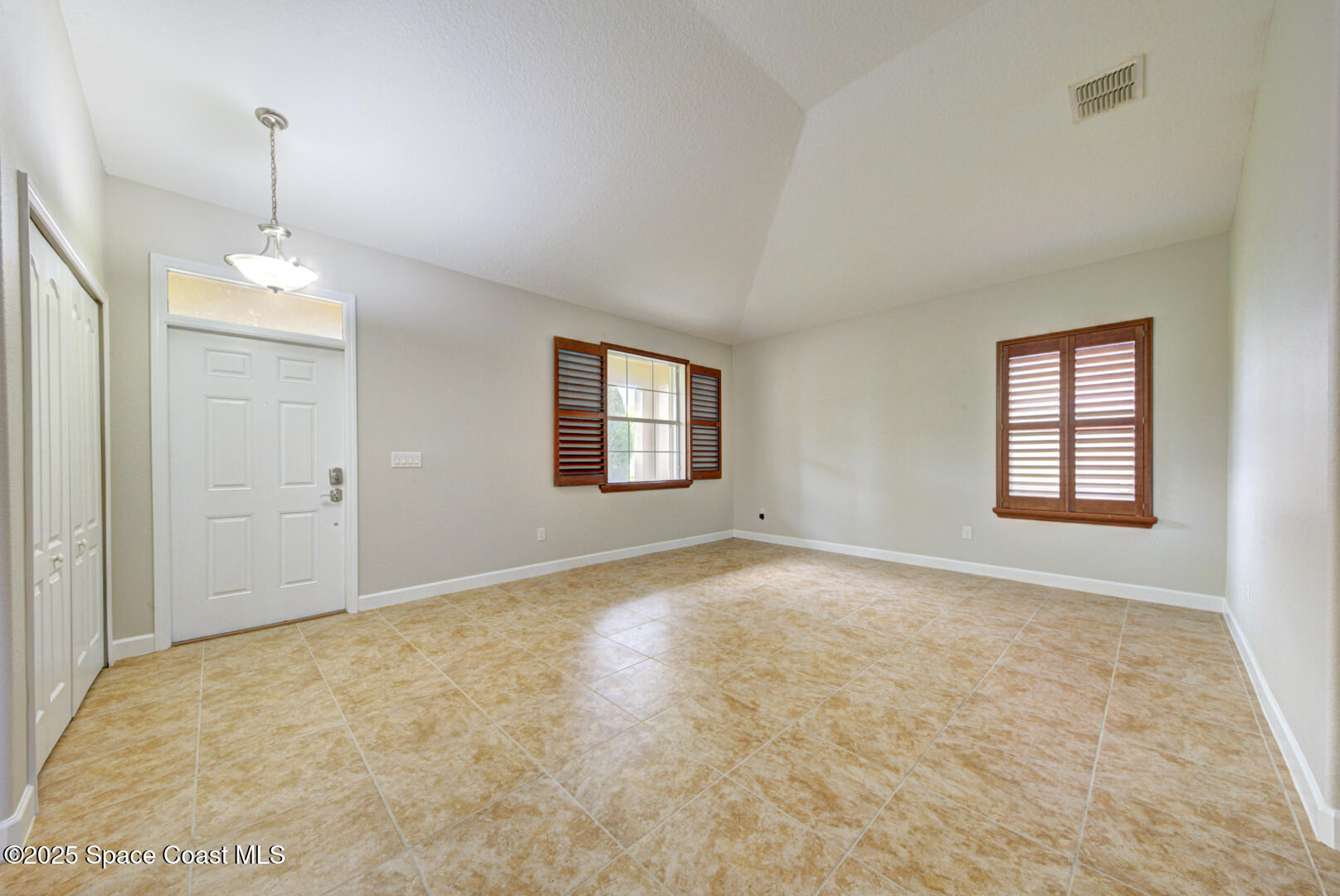 3352 Russ Place Melbourne, FL 32940 - Photo 8 of 67 an empty room with windows