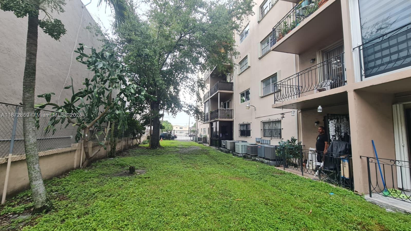 3640 Northwest 9th Street, Unit 105 Miami, FL 33125 - Photo 21 of 31 a view of a yard in front of house