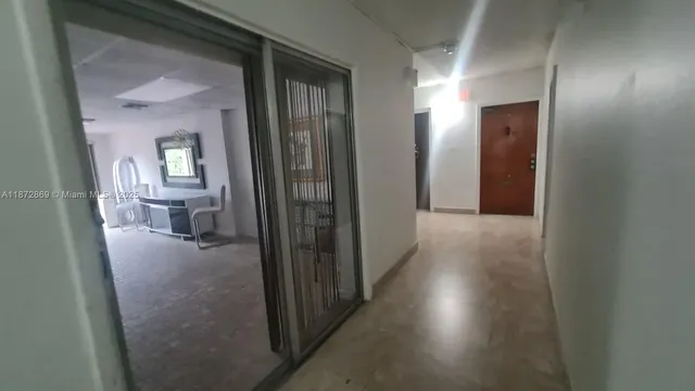 a view of a pool with a yard