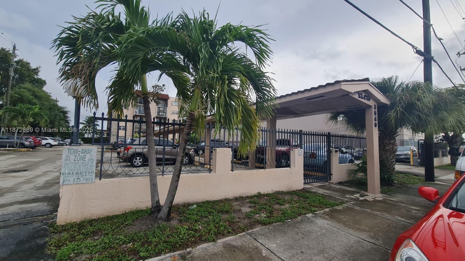 3640 Northwest 9th Street, Unit 105 Miami, FL 33125 - Photo 3 of 31 a view of a park with swings and slides