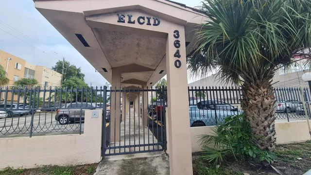 a view of entryway and sign board