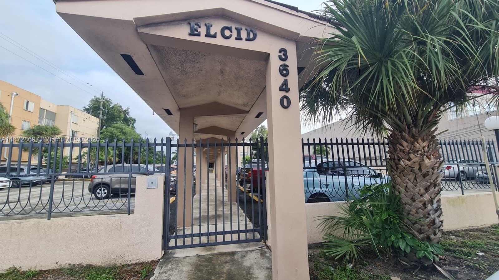 3640 Northwest 9th Street, Unit 105 Miami, FL 33125 - Photo 4 of 31 a view of entryway and sign board