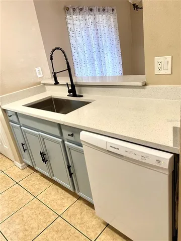 a close view of sink and washer