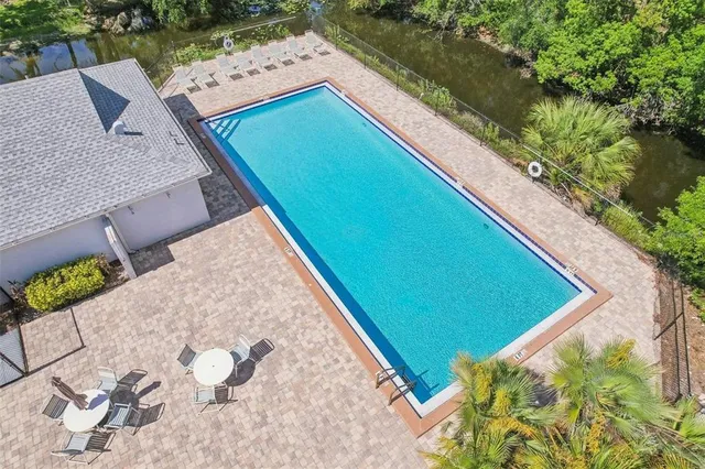 a view of swimming pool with a yard