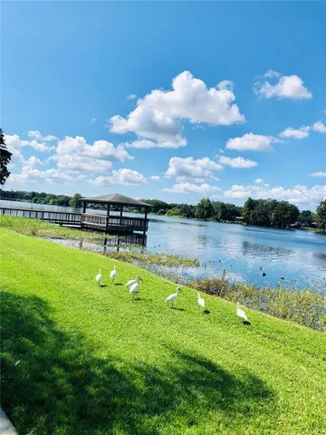 a view of a lake with a big yard