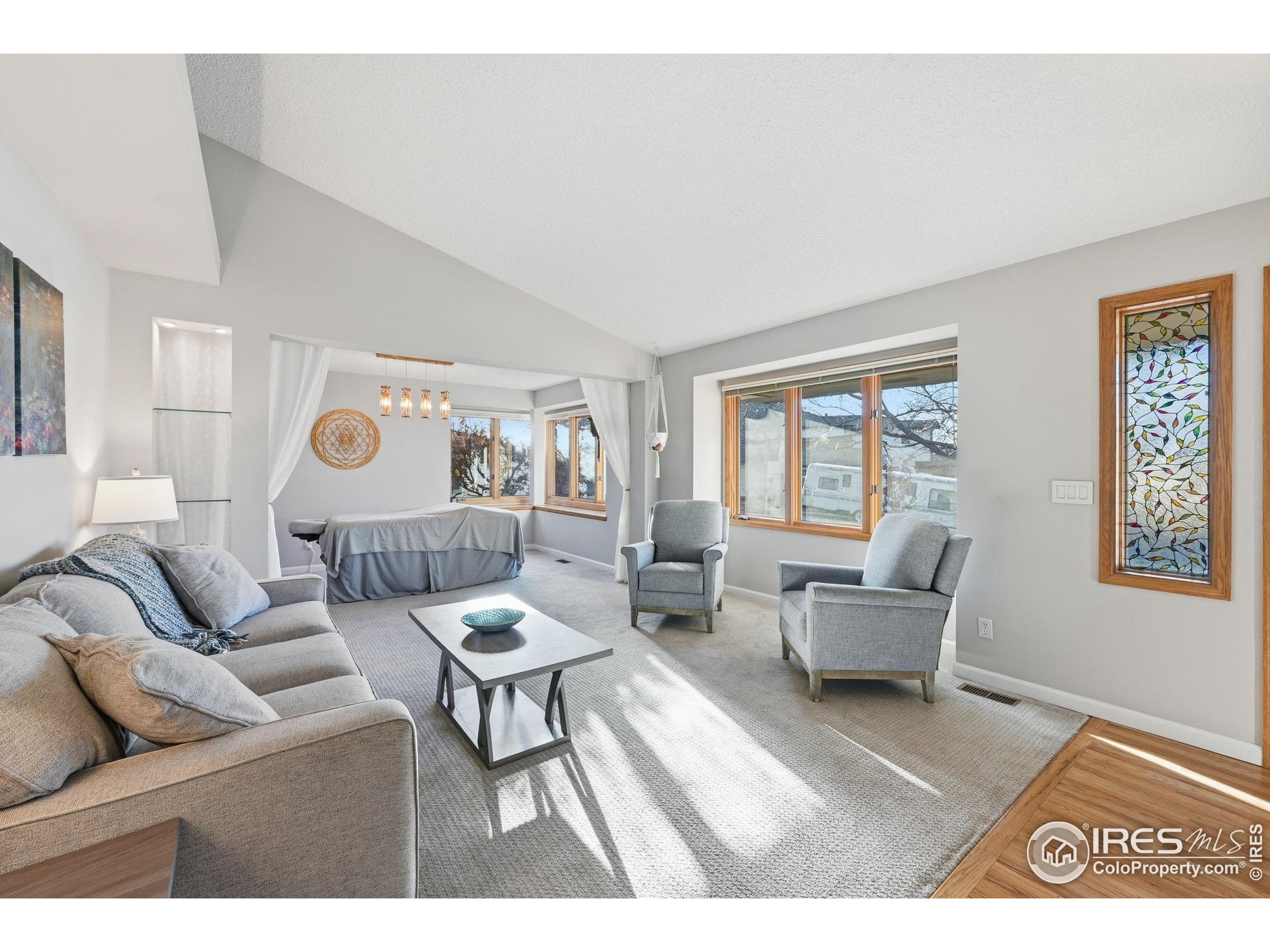 2158 Rockspray Court Longmont, CO 80503 - Photo 7 of 35 a living room with furniture and a window