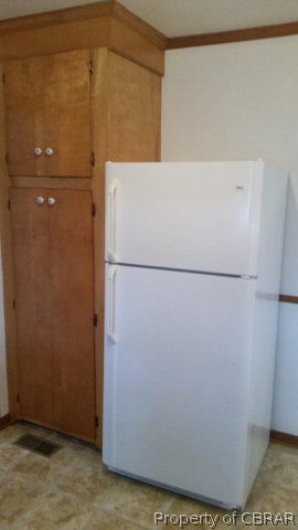 292 Evans Road Mathews, VA 23109 - Photo 12 of 37 a view of a refrigerator in a kitchen