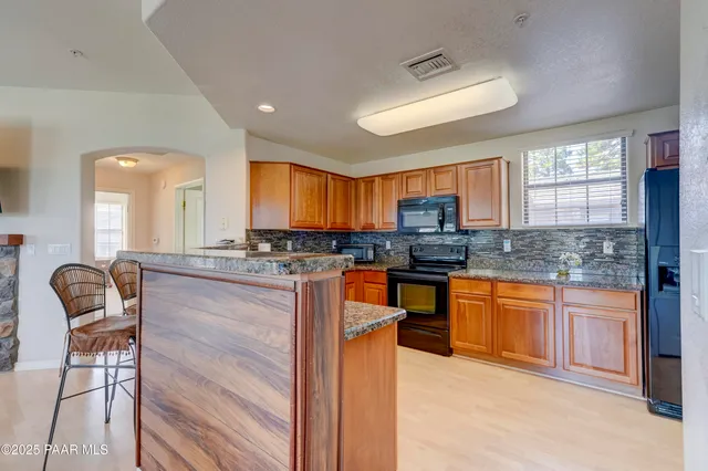 a bedroom with bed and window