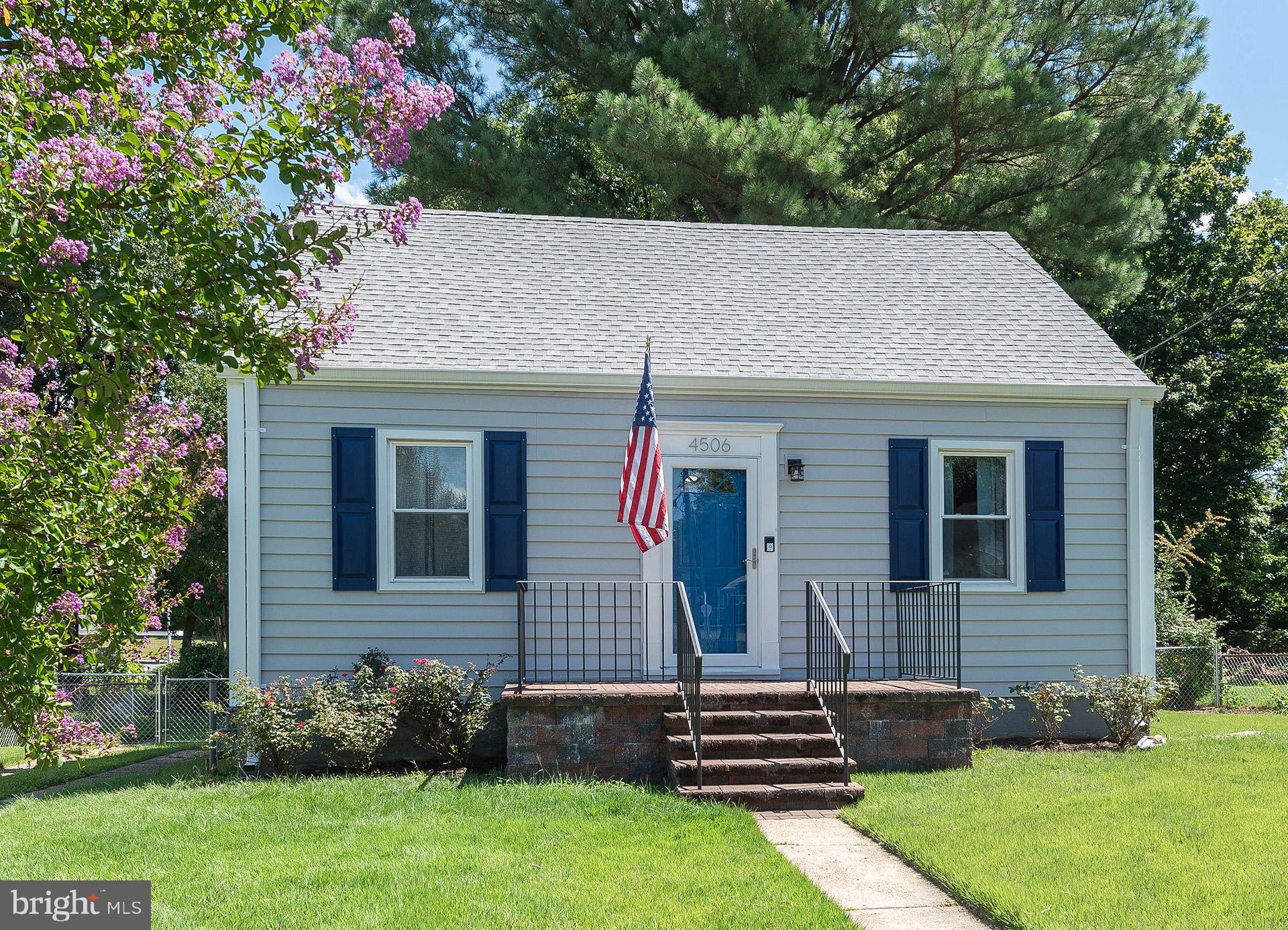4506 Morgan Road Morningside, MD 20746 - Photo 1 of 22 a front view of a house with garden