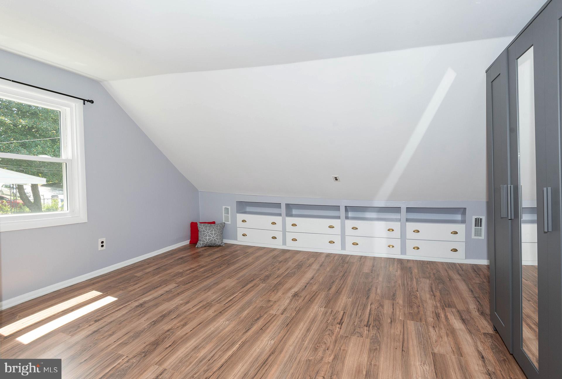 4506 Morgan Road Morningside, MD 20746 - Photo 12 of 22 a room with storage and utility
