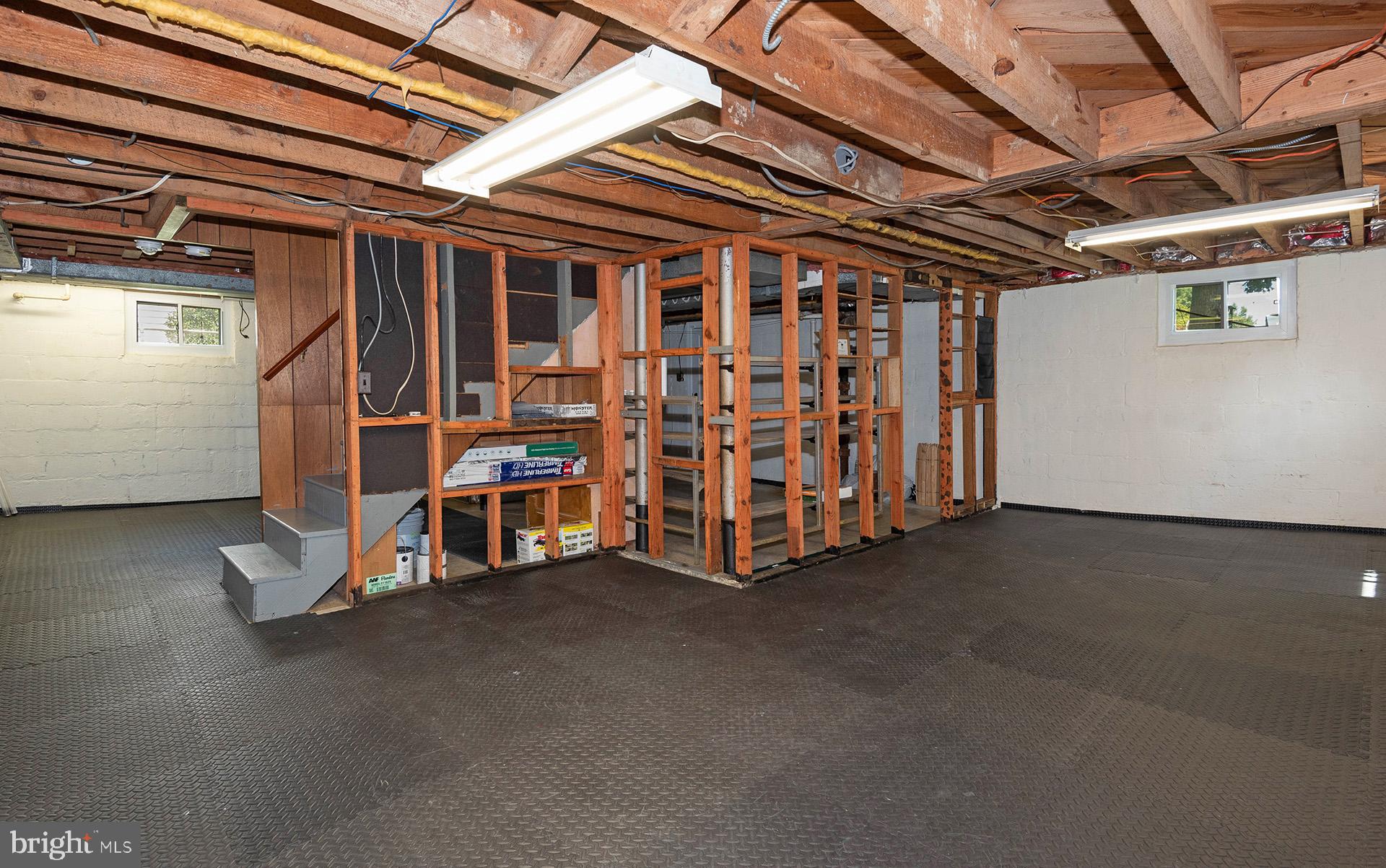 4506 Morgan Road Morningside, MD 20746 - Photo 16 of 22 a view of an empty room with stairs