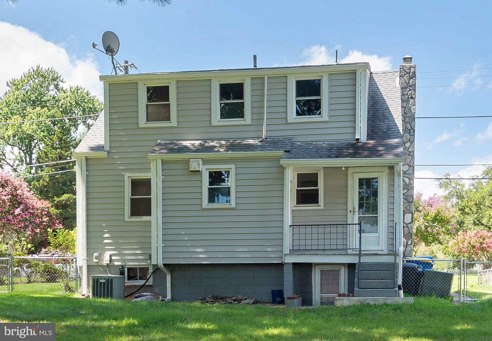 4506 Morgan Road Morningside, MD 20746 - Photo 18 of 22 a front view of a house with a yard
