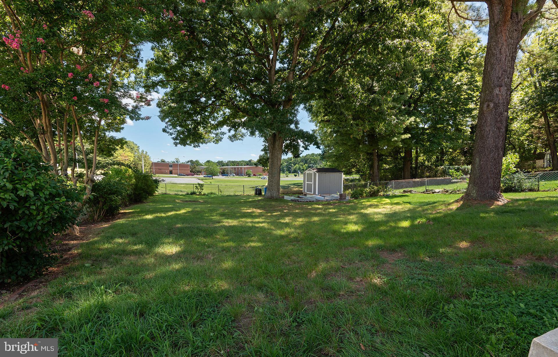 4506 Morgan Road Morningside, MD 20746 - Photo 20 of 22 a view of outdoor space with deck and yard