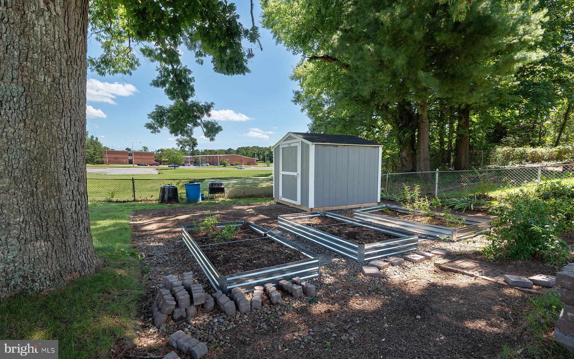 4506 Morgan Road Morningside, MD 20746 - Photo 21 of 22 a view of a backyard with wooden fence