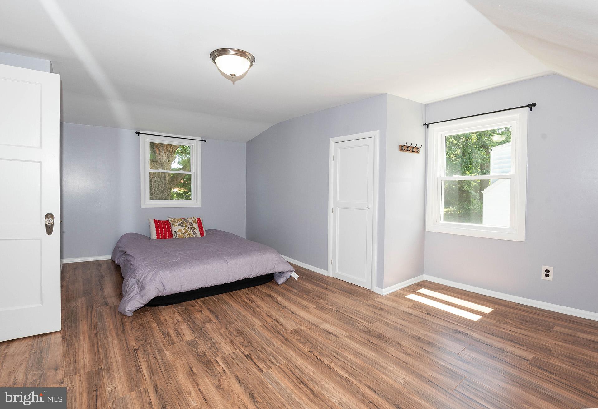 4506 Morgan Road Morningside, MD 20746 - Photo 10 of 22 a bedroom with bed and window