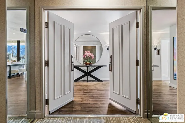a view of a livingroom from a hallway