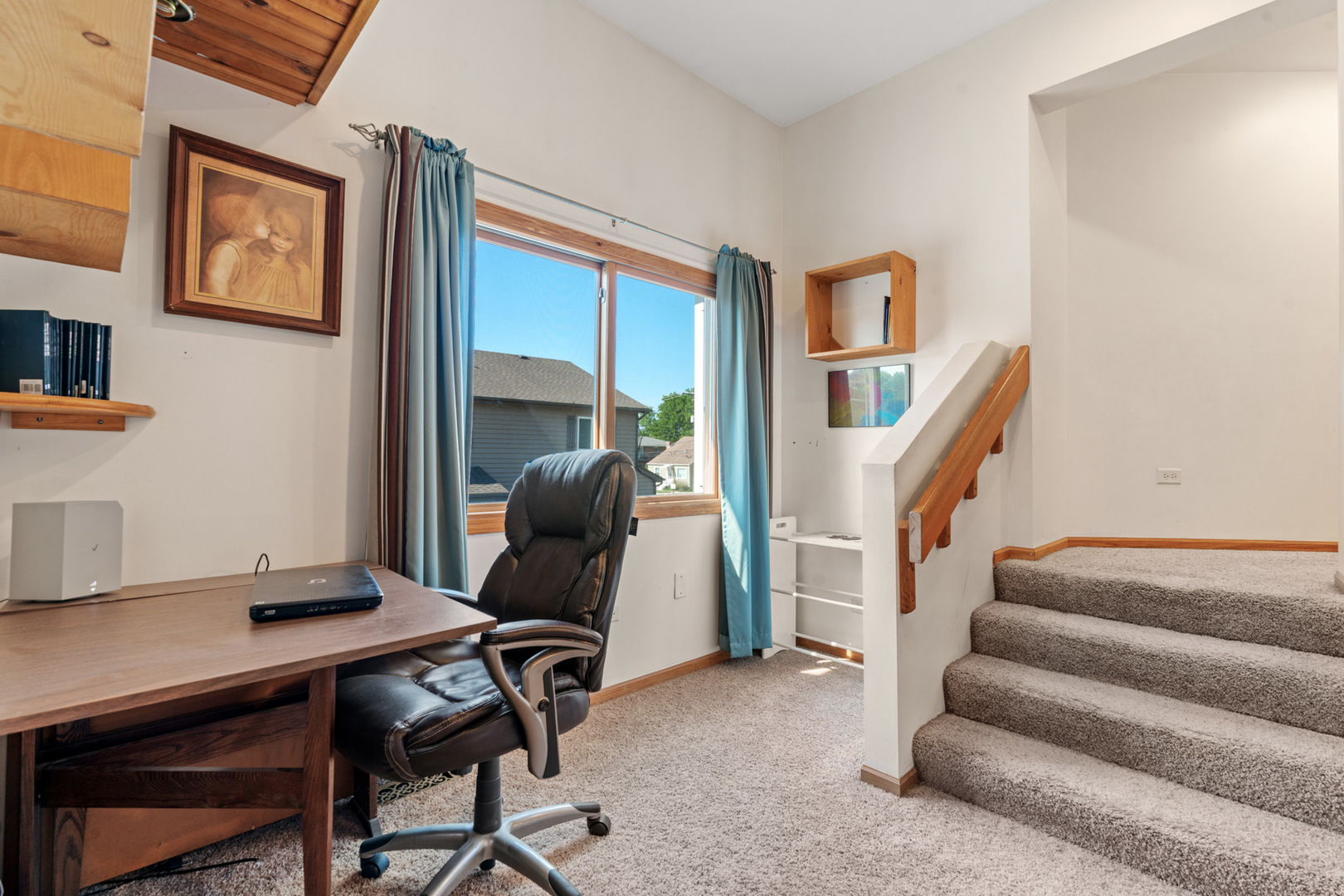 206 Washington Street Oswego, IL 60543 - Photo 27 of 45 a view of a workspace with furniture and a window