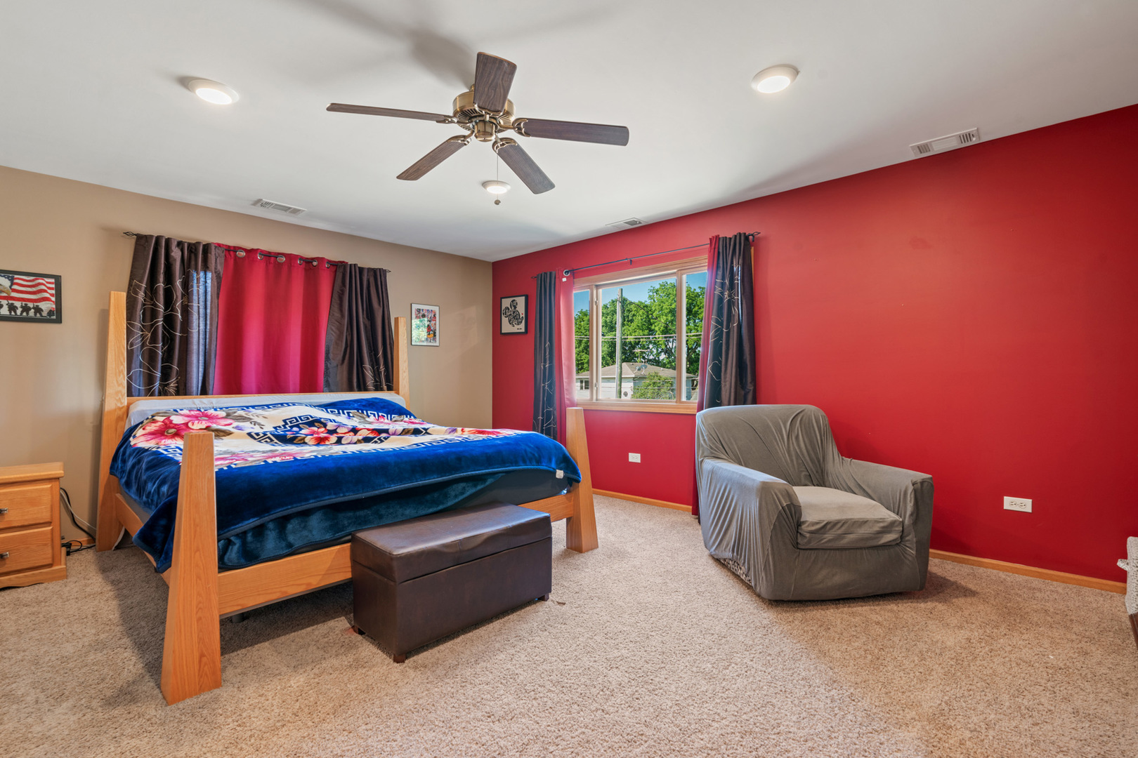 206 Washington Street Oswego, IL 60543 - Photo 30 of 45 a bedroom with a bed and a window