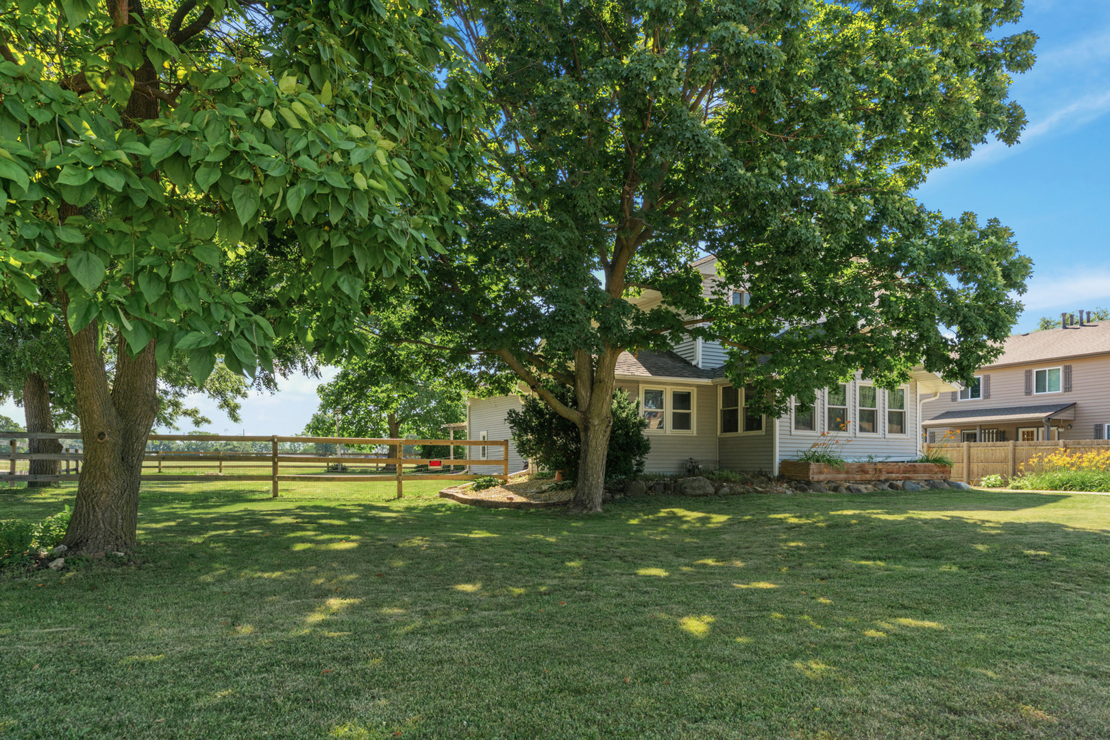 206 Washington Street Oswego, IL 60543 - Photo 4 of 45 a front view of a house with a yard