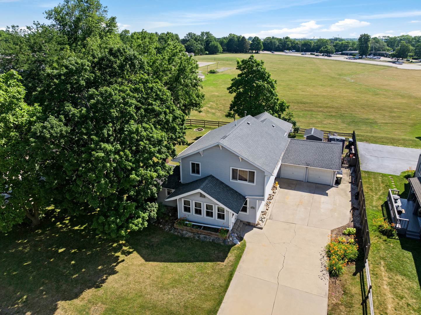 206 Washington Street Oswego, IL 60543 - Photo 45 of 45 a aerial view of a house with a yard and lake view