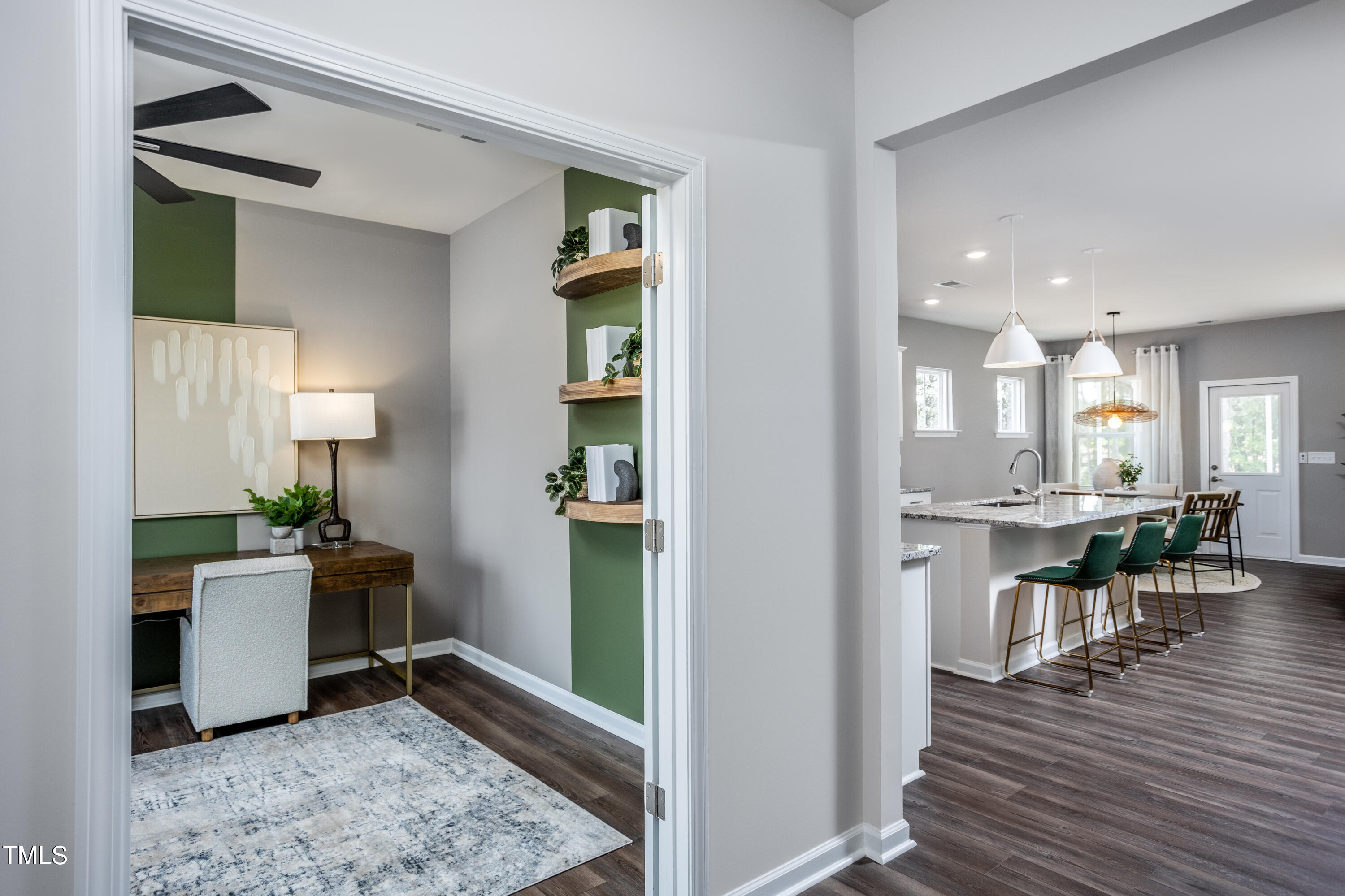 175 Glen Clova Drive Raleigh, NC 27603 - Photo 3 of 26 a view of a kitchen and dining room