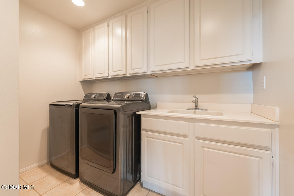 2307 Shakespeare Drive Oxnard, CA 93033 - Photo 15 of 42 a utility room with sink dryer and washer