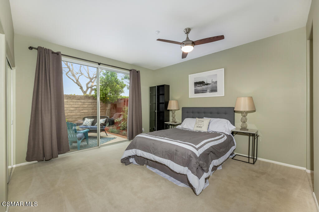 2307 Shakespeare Drive Oxnard, CA 93033 - Photo 17 of 42 a bedroom with a bed and a large window