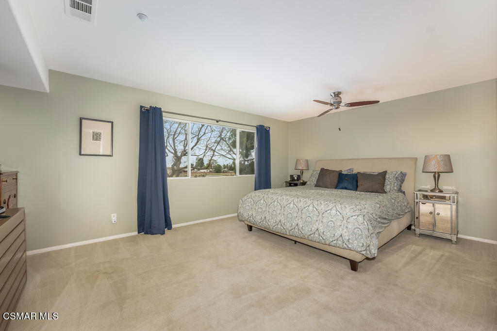 2307 Shakespeare Drive Oxnard, CA 93033 - Photo 21 of 42 a bedroom with a large bed cabinet and window