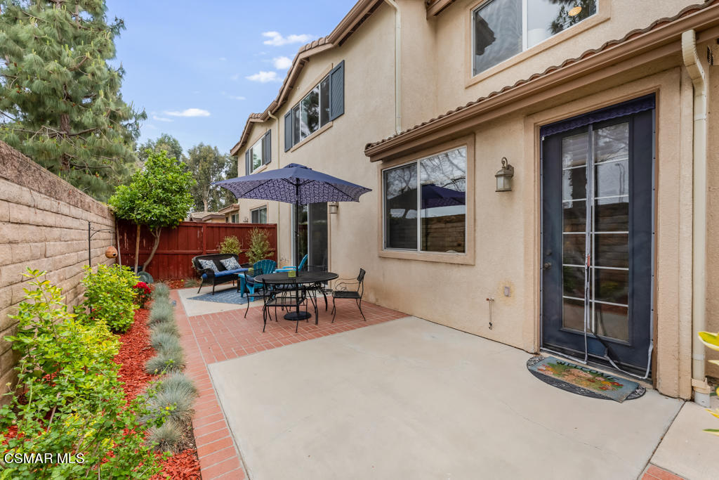 2307 Shakespeare Drive Oxnard, CA 93033 - Photo 29 of 42 a view of a house with a patio and a yard