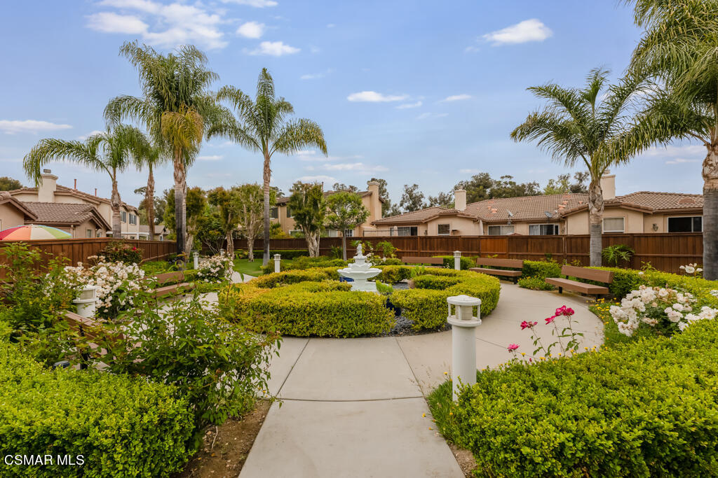 2307 Shakespeare Drive Oxnard, CA 93033 - Photo 36 of 42 a view of a swimming pool with a table and chairs