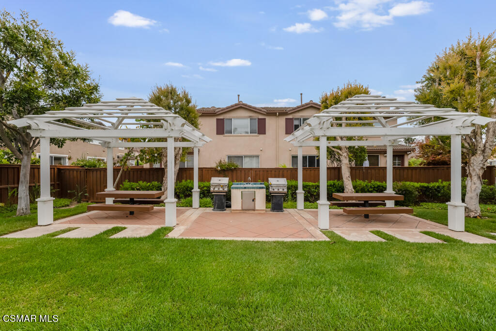 2307 Shakespeare Drive Oxnard, CA 93033 - Photo 42 of 42 a view of a house with a yard patio and fire pit