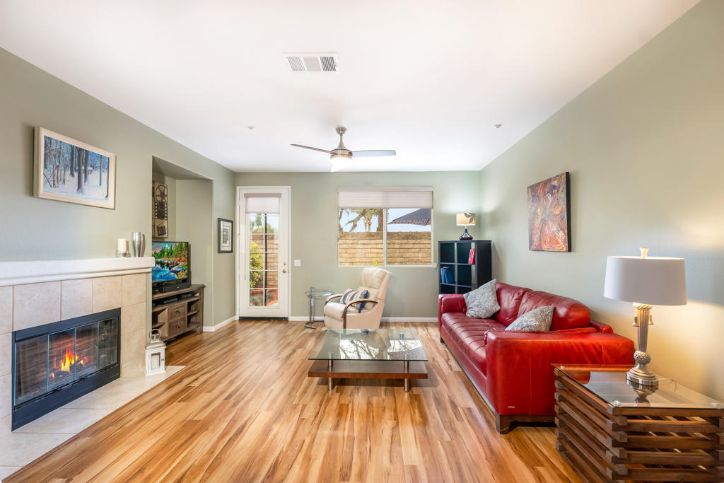 2307 Shakespeare Drive Oxnard, CA 93033 - Photo 7 of 42 a living room with furniture and a fireplace