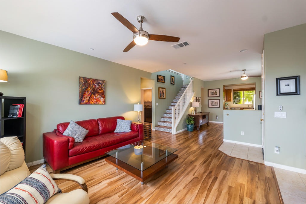 2307 Shakespeare Drive Oxnard, CA 93033 - Photo 9 of 42 a living room with furniture and a wooden floor