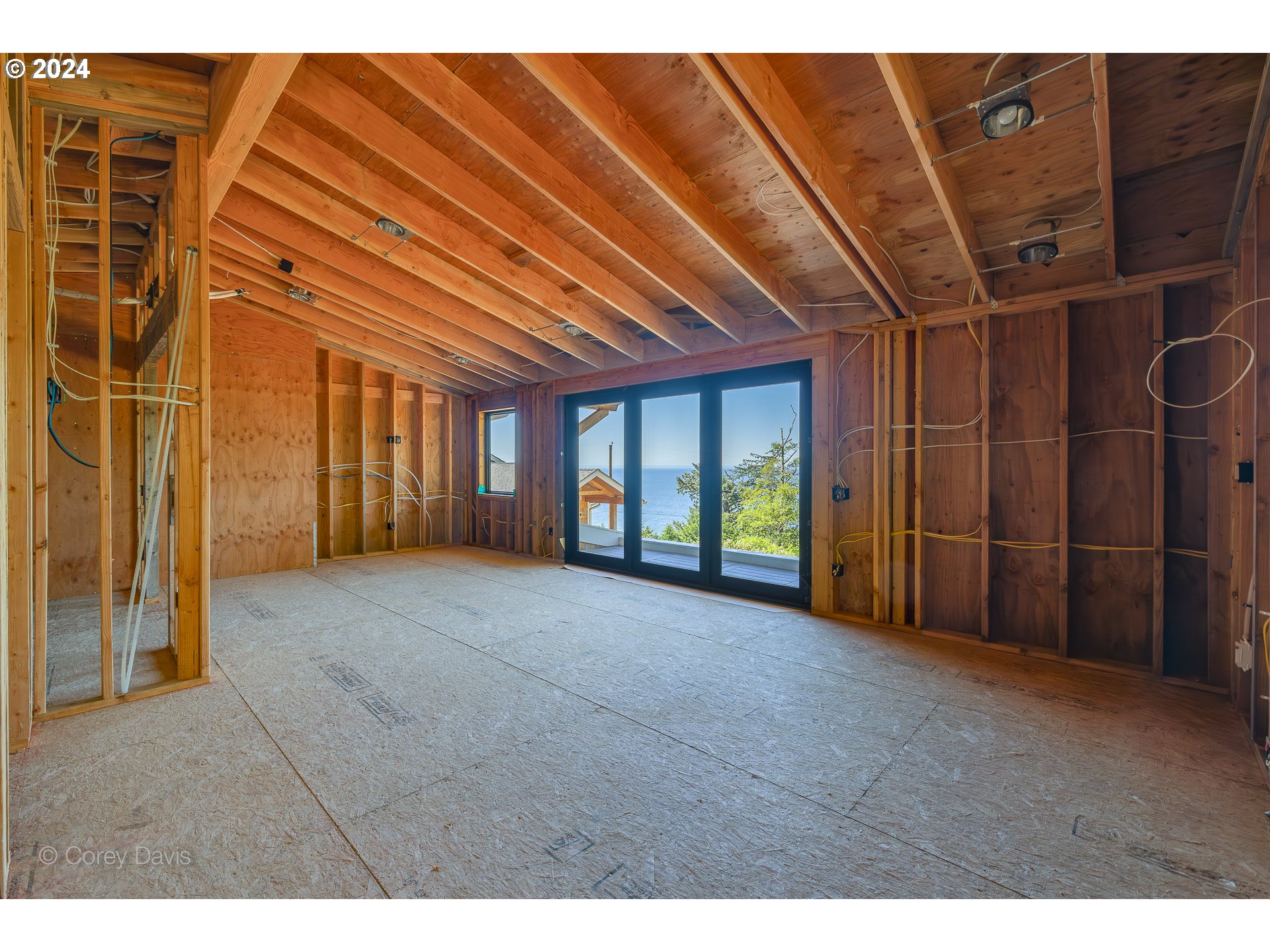 38625 Beulah Reed Road Nehalem, OR 97131 - Photo 25 of 38 a view of an empty room with a window