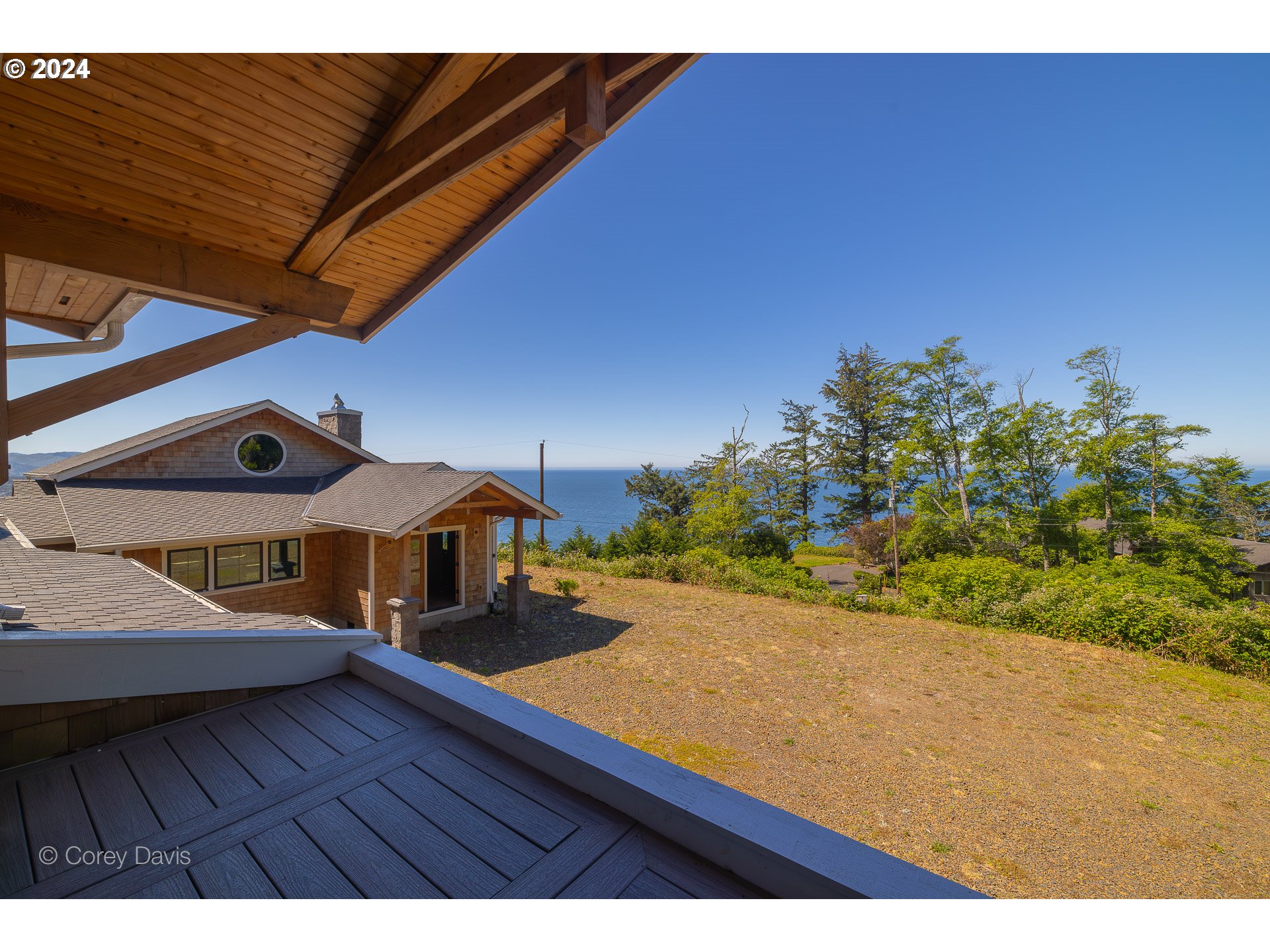 38625 Beulah Reed Road Nehalem, OR 97131 - Photo 27 of 38 a view of a balcony with chairs
