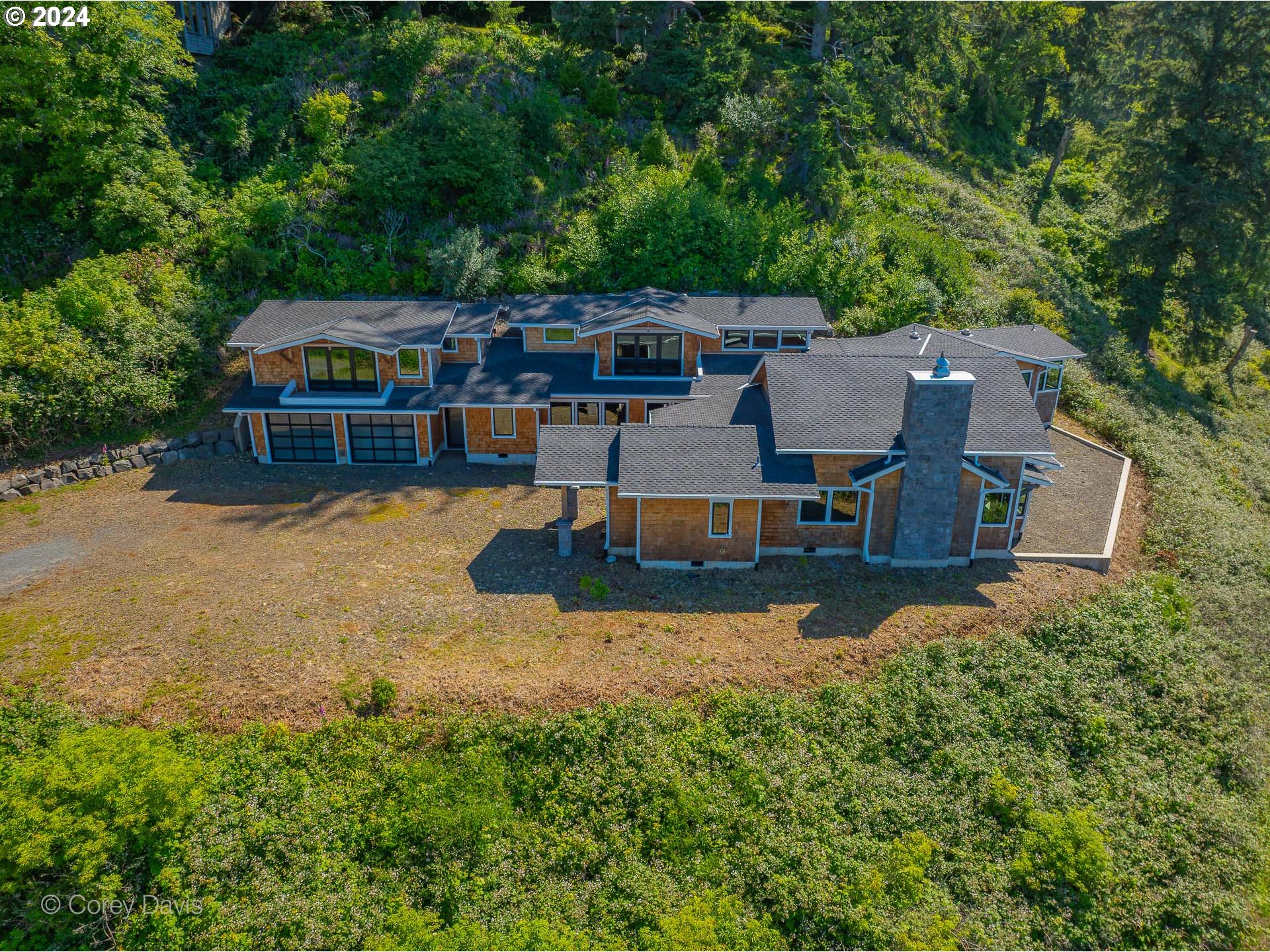 38625 Beulah Reed Road Nehalem, OR 97131 - Photo 4 of 38 an aerial view of a house with swimming pool a yard and a large tree