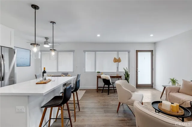 a view of a hallway with washer and dryer