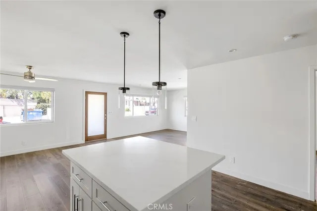 a bathroom with a shower and a sink