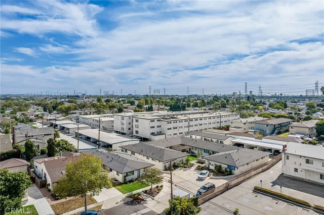 an aerial view of residential building with parking space