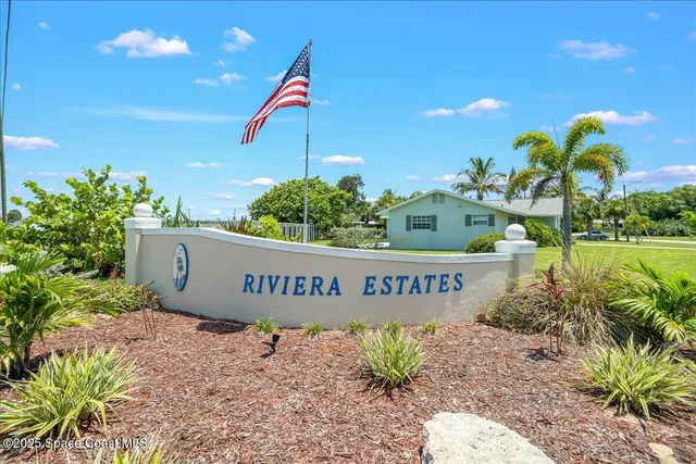 a sign on the side of the road