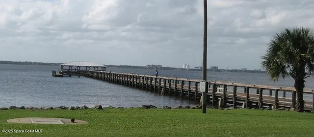 a view of a terrace with yard