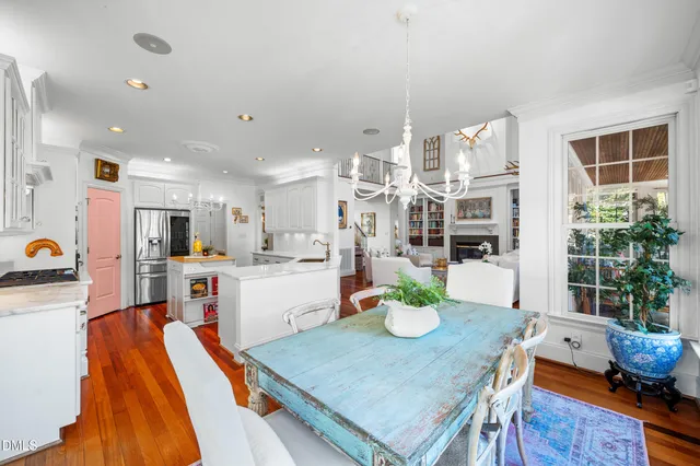 a view of walk in closet with clothes