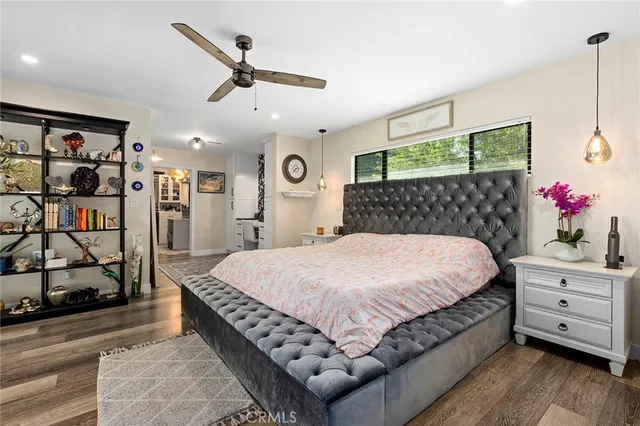 a bed room with a bed and a walk in closet