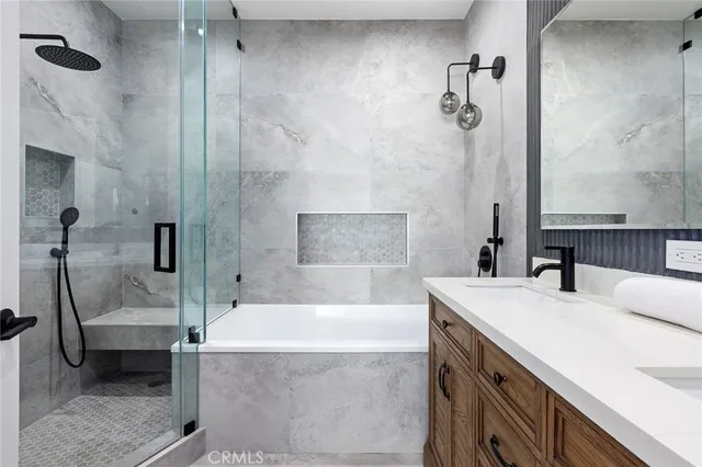 swimming pool view with a seating space