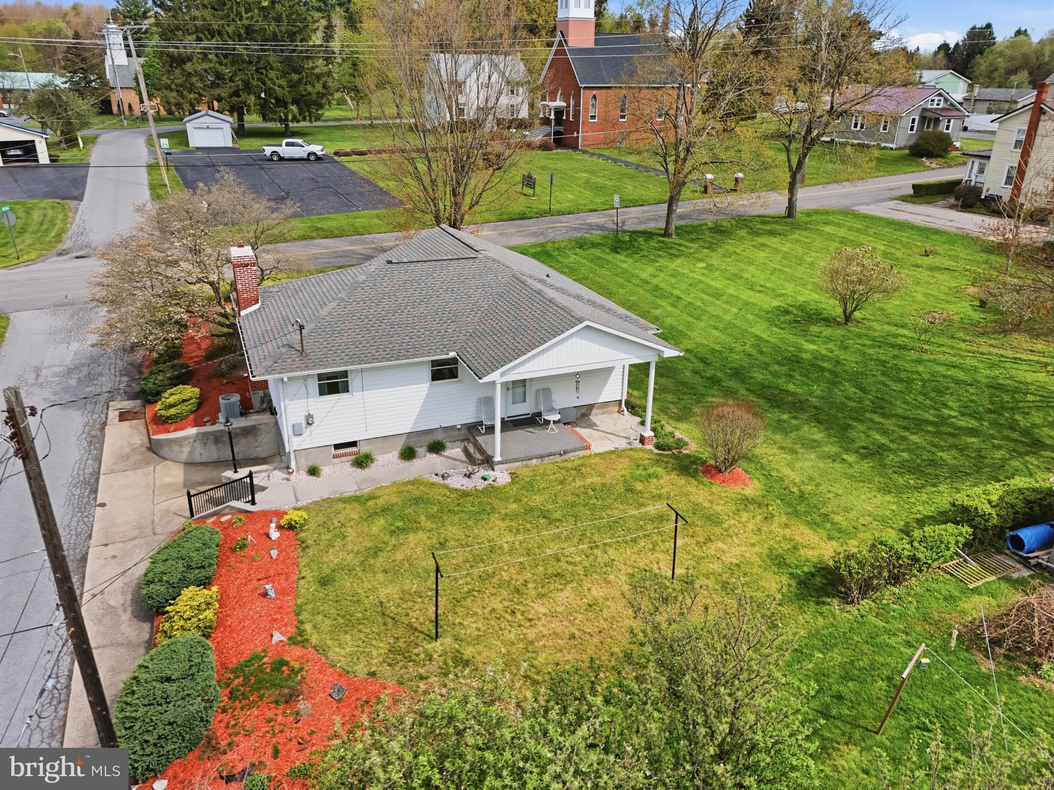 684 Powell Street Hawk Run, PA 16840 - Photo 7 of 35 Aerial property view 2 showing roof.